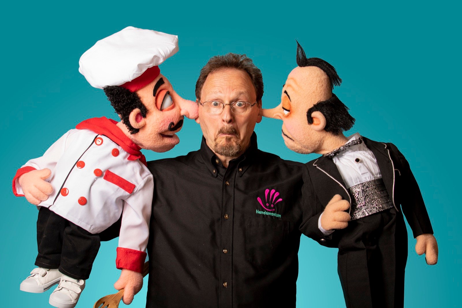 Comedic portrait of a performer between two characters